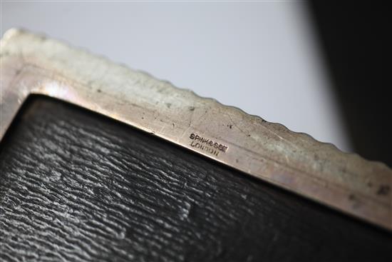 An Edwardian silver mounted cigarette box, 8in.